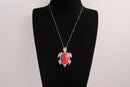 Raw Earth Crystals red howlite turtle necklace crafted from natural stone to support calm focus, stress relief, and emotional grounding.