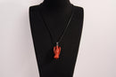 Raw Earth Crystals red jasper angel pendant necklace, made from natural red jasper to enhance grounding, stability, and inner strength.
