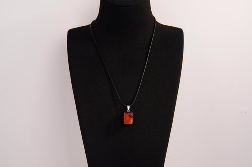 Raw Earth Crystals red jasper rectangle pendant necklace featuring natural crystal jewelry designed for grounding, strength, and emotional stability.