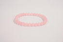 Rose quartz beaded bracelet from Raw Earth Crystals, featuring natural gemstones for love, compassion, and emotional healing.