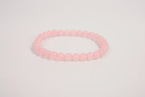 Rose quartz beaded bracelet from Raw Earth Crystals, featuring natural gemstones for love, compassion, and emotional healing.