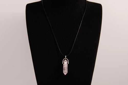 Raw Earth Crystals rose quartz necklace featuring a pointed natural stone pendant, designed to promote love, compassion, and emotional healing.