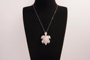 Raw Earth Crystals rose quartz turtle necklace made from natural crystal to open the heart, encourage self-love, and invite gentle emotional healing.