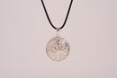 Raw Earth Crystals rose quartz pendant featuring a tree of life design, crafted with natural crystal for love, compassion, and emotional healing.