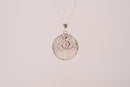 Raw Earth Crystals rose quartz pendant featuring a tree of life design, crafted with natural crystal for love, compassion, and emotional healing.