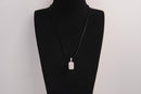 Raw Earth Crystals rose quartz rectangle pendant necklace featuring natural crystal jewelry designed for love, emotional healing, and inner peace.