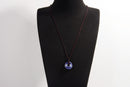 Raw Earth Crystals sodalite disc pendant necklace crafted from natural crystal for mental clarity, communication, and emotional balance.