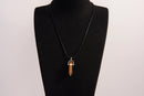Raw Earth Crystals tiger eye necklace with a pointed natural stone pendant, designed to boost confidence, provide protection, and enhance mental clarity.