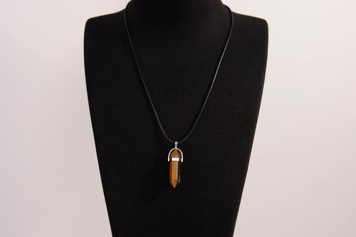 Raw Earth Crystals tiger eye necklace with a pointed natural stone pendant, designed to boost confidence, provide protection, and enhance mental clarity.