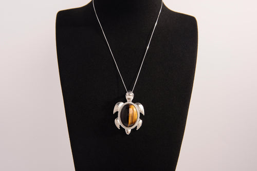 Raw Earth Crystals tiger eye turtle necklace crafted from natural stone to boost courage, focus, and personal power with grounding energy.