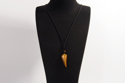 Raw Earth Crystals tiger eye point pendant necklace featuring natural crystal jewelry designed for confidence, focus, and personal power.
