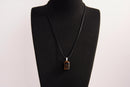 Raw Earth Crystals tiger eye rectangle pendant necklace featuring natural crystal jewelry designed for confidence, focus, and personal power.