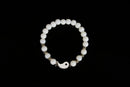Raw Earth Crystals white jade bracelet with yin yang design, crafted from natural crystal, enhances clarity, peace, and emotional balance.