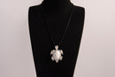 Raw Earth Crystals white turquoise turtle necklace crafted from natural stone to encourage calmness, clarity, and emotional healing.